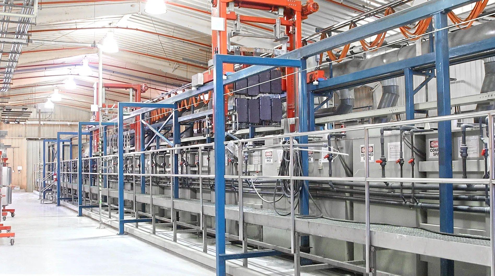 Automated titanium and aluminum anodizing line for medical device components